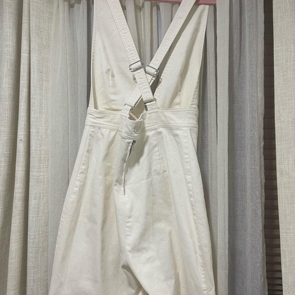 Gorgeous bell bottom open front and back jumpsuit